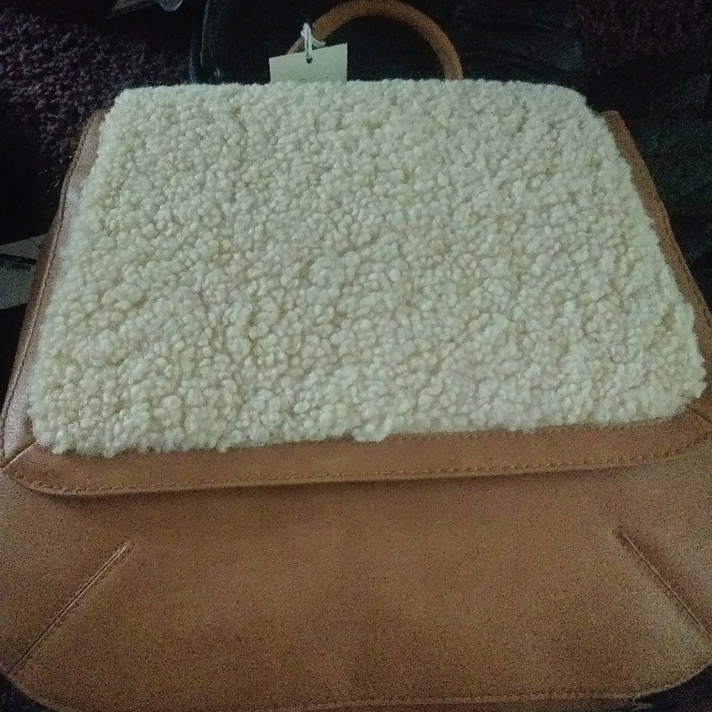 A new day convertible backpack/purse